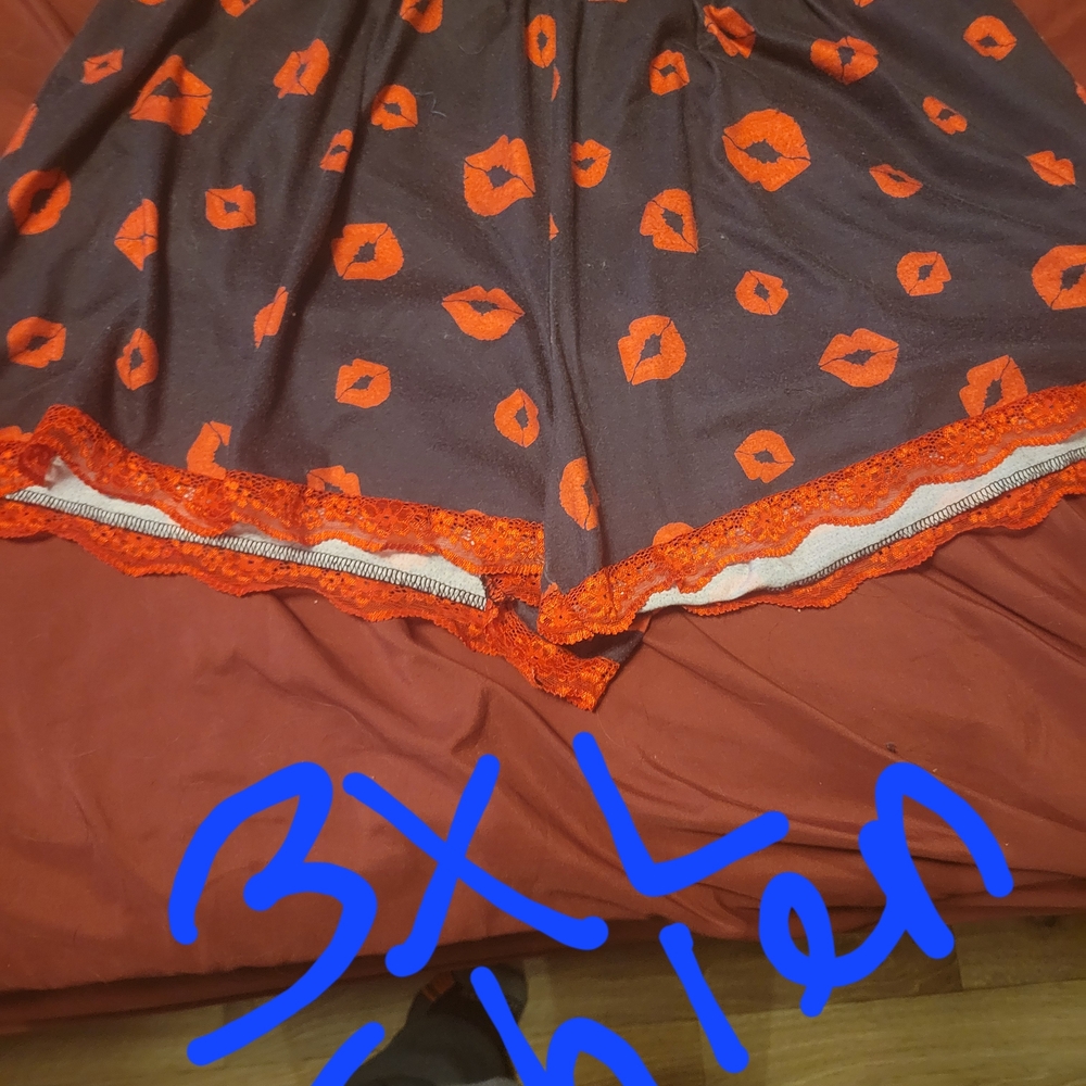 Chic Black Skirt with Orange Lip Pattern